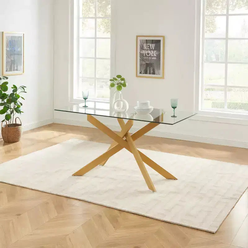 Table de salle à manger avec plateau en verre et pieds en acier
