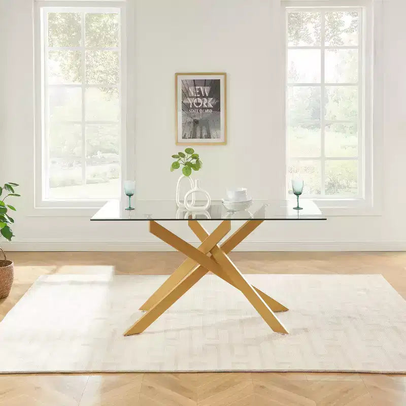 Table de salle à manger avec plateau en verre et pieds en acier