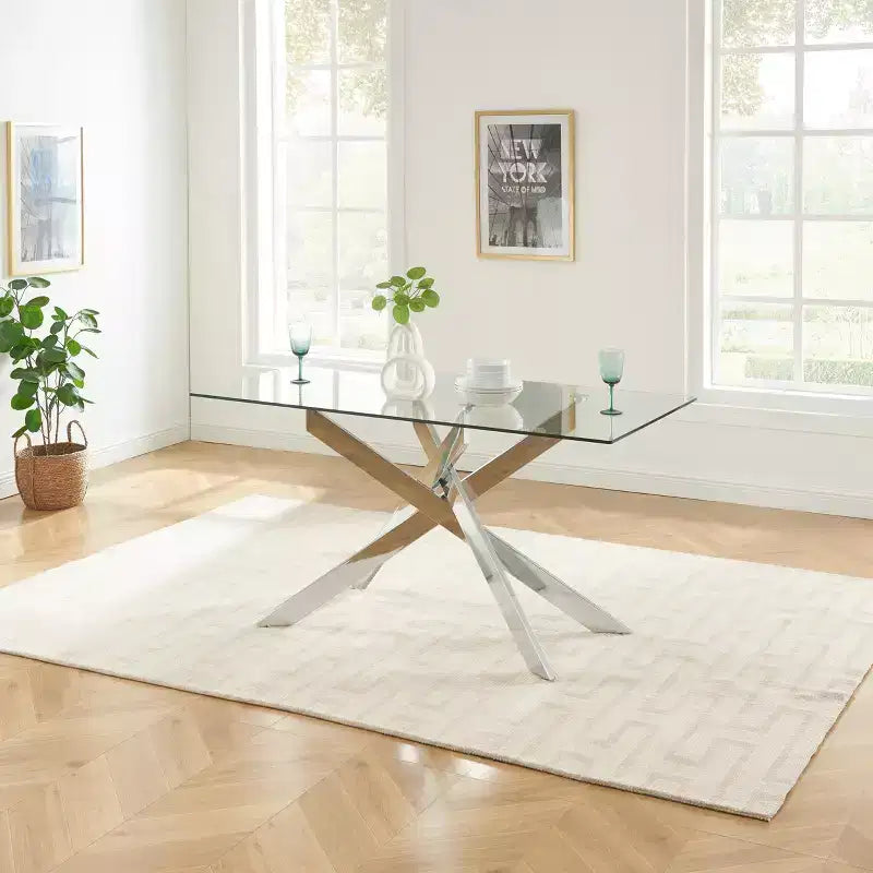 Table de salle à manger avec plateau en verre et pieds en acier