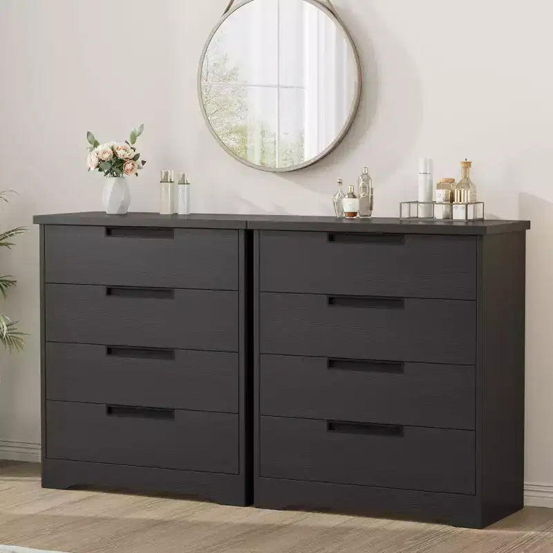 Commode de chambre à 4 tiroirs noire avec poignées encastrées