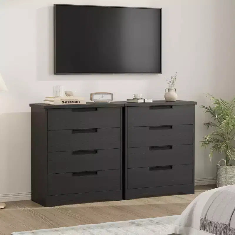 Commode de chambre à 4 tiroirs noire avec poignées encastrées