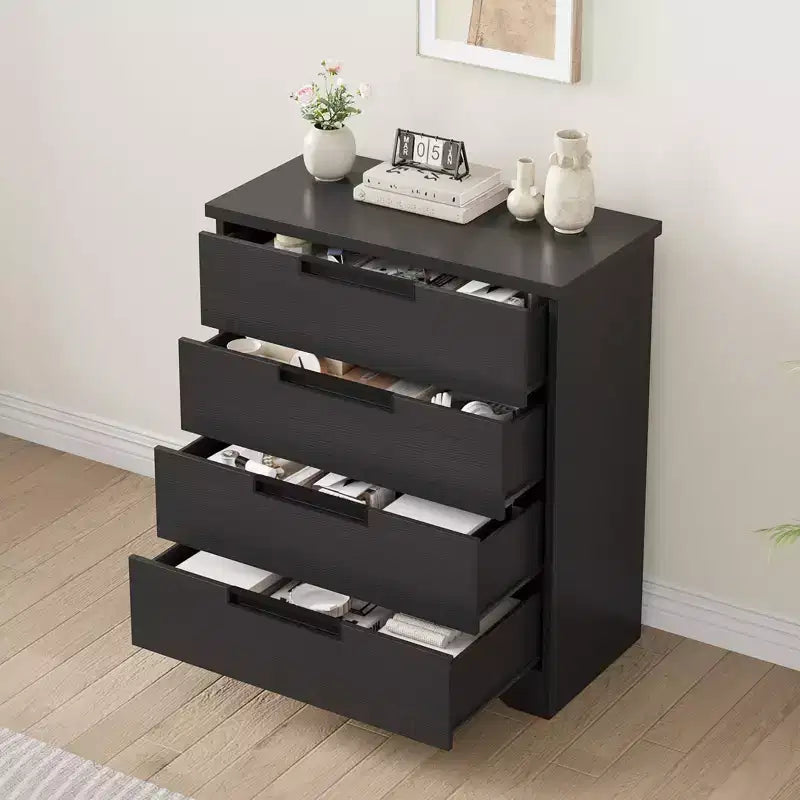 Commode de chambre à 4 tiroirs noire avec poignées encastrées