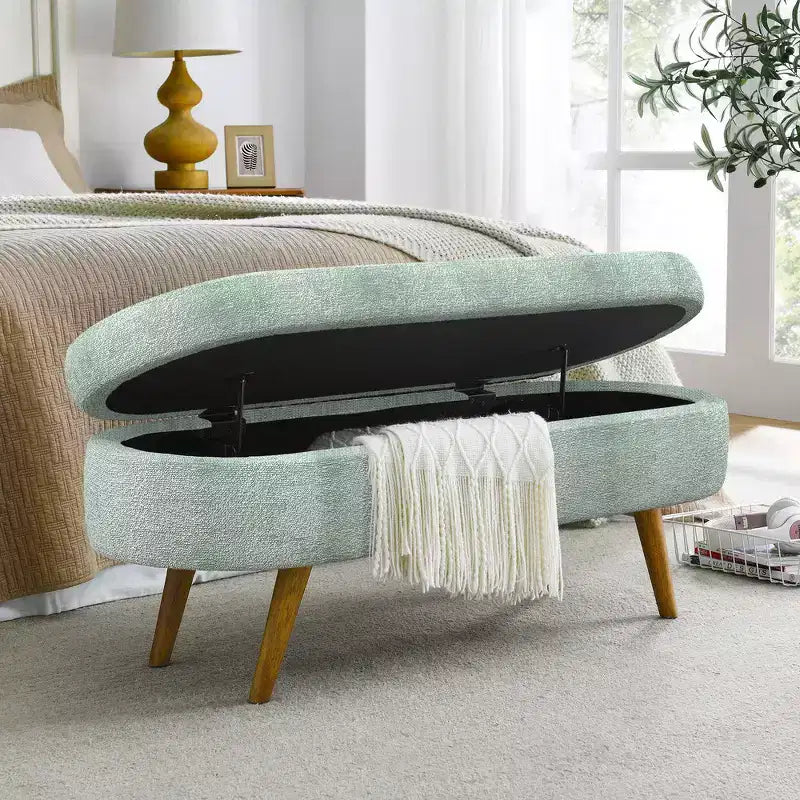 Banc de rangement ottoman ovale en tissu avec pieds en bois d'hévéa
