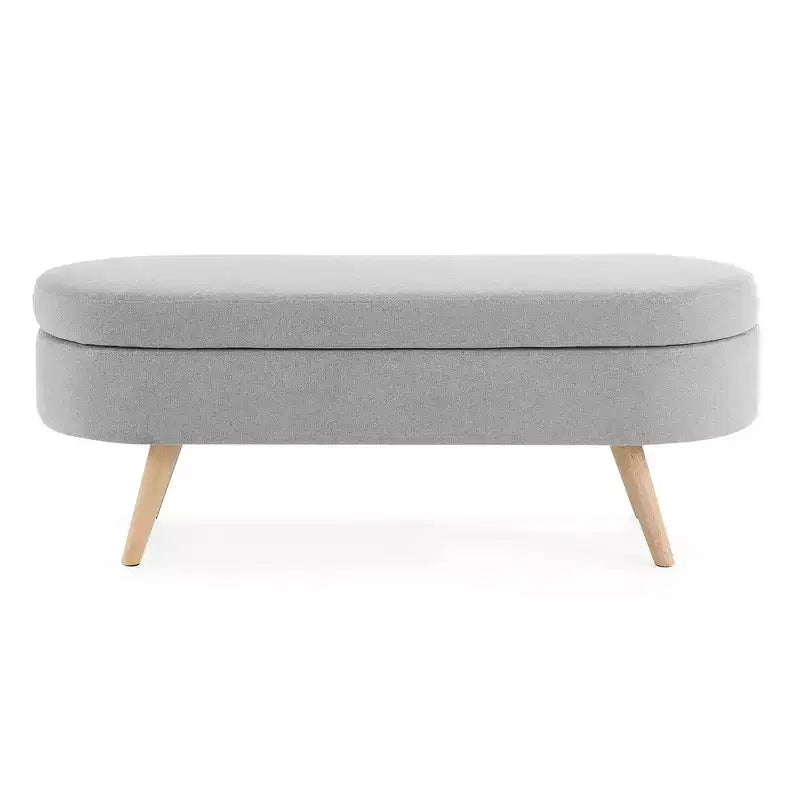 Banc de rangement ottoman ovale en tissu avec pieds en bois d'hévéa