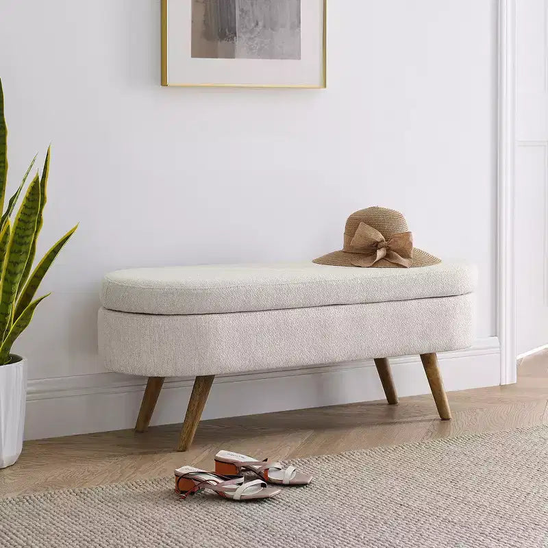 Banc de rangement ottoman ovale en tissu avec pieds en bois d'hévéa
