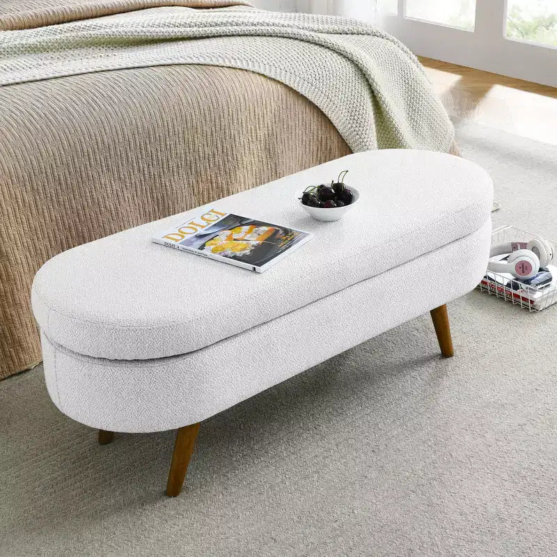 Banc de rangement ottoman ovale en tissu avec pieds en bois d'hévéa