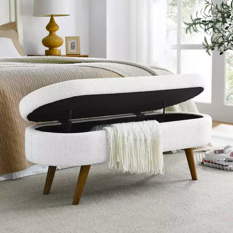 Banc de rangement ottoman ovale en tissu avec pieds en bois d'hévéa